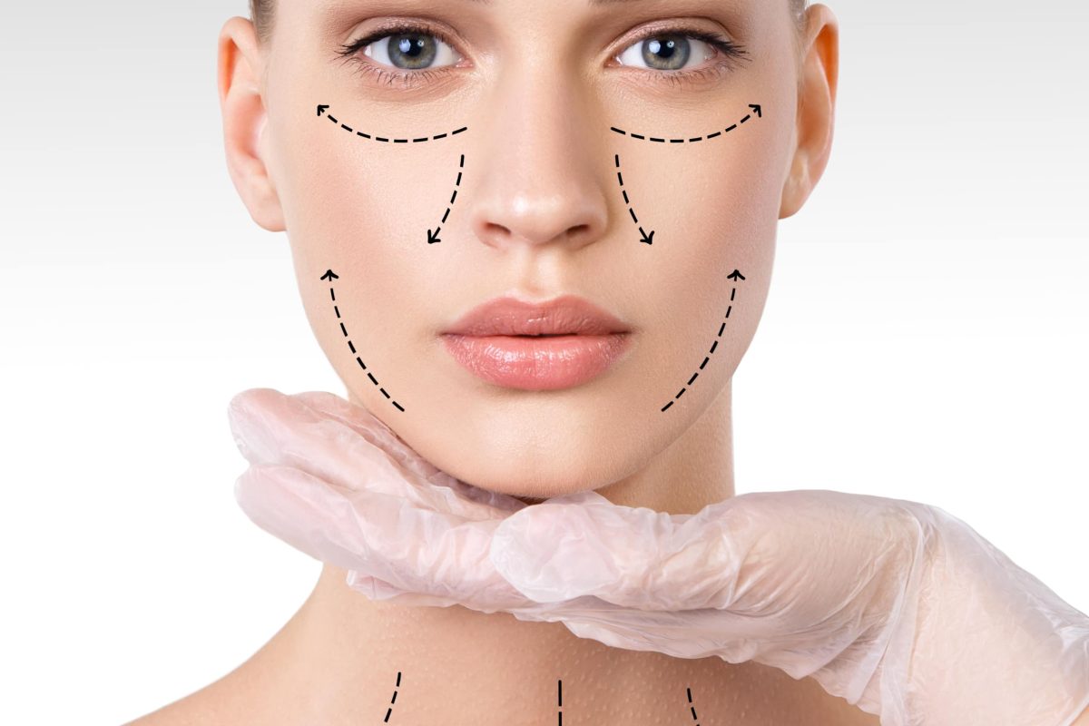 Beautiful Young Woman with clean fresh skin . Facial treatment